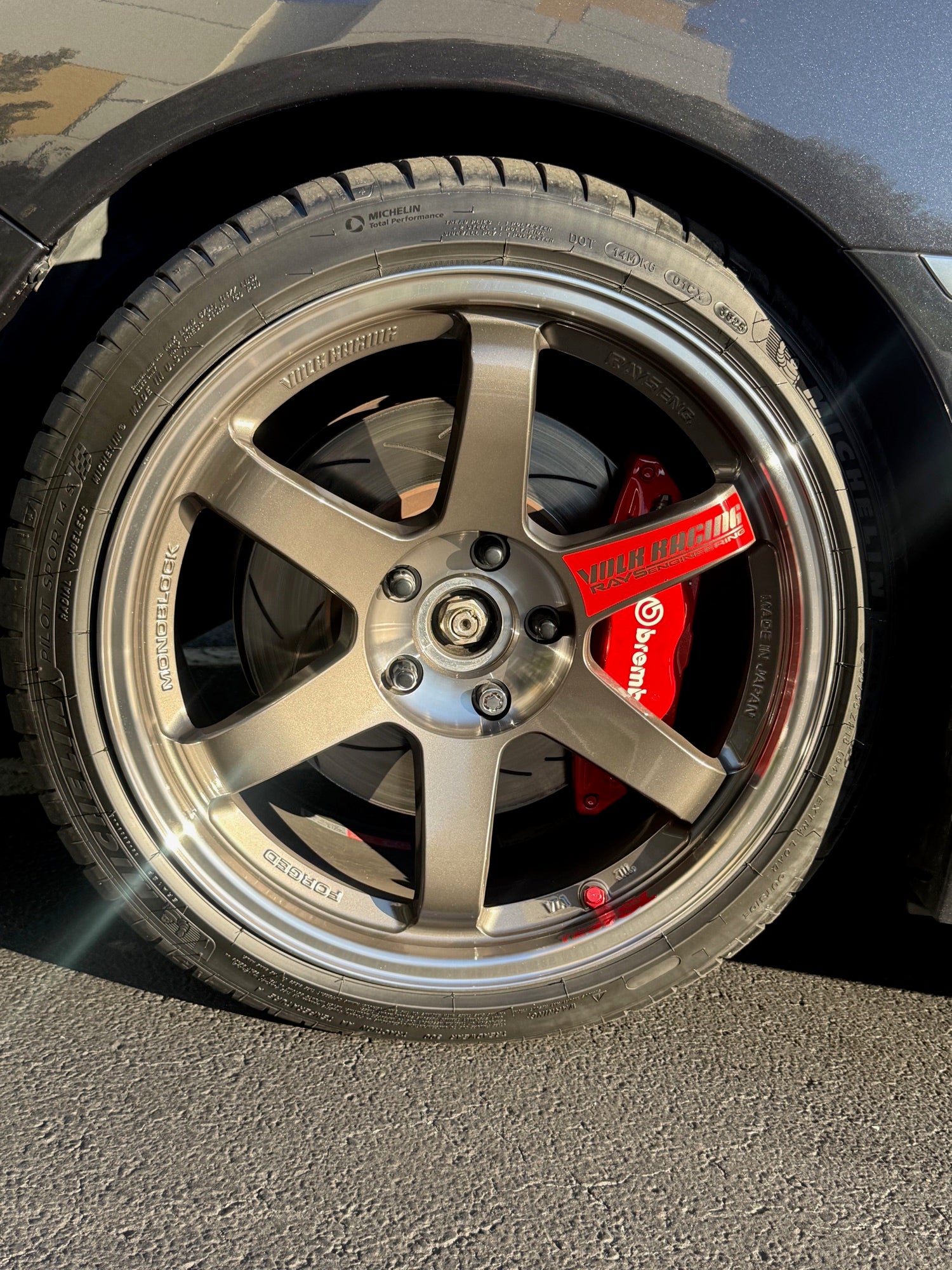 Bronze RAYS Volk wheel on a Subaru STI with red Brembo calipers fitted at Velocity Factor