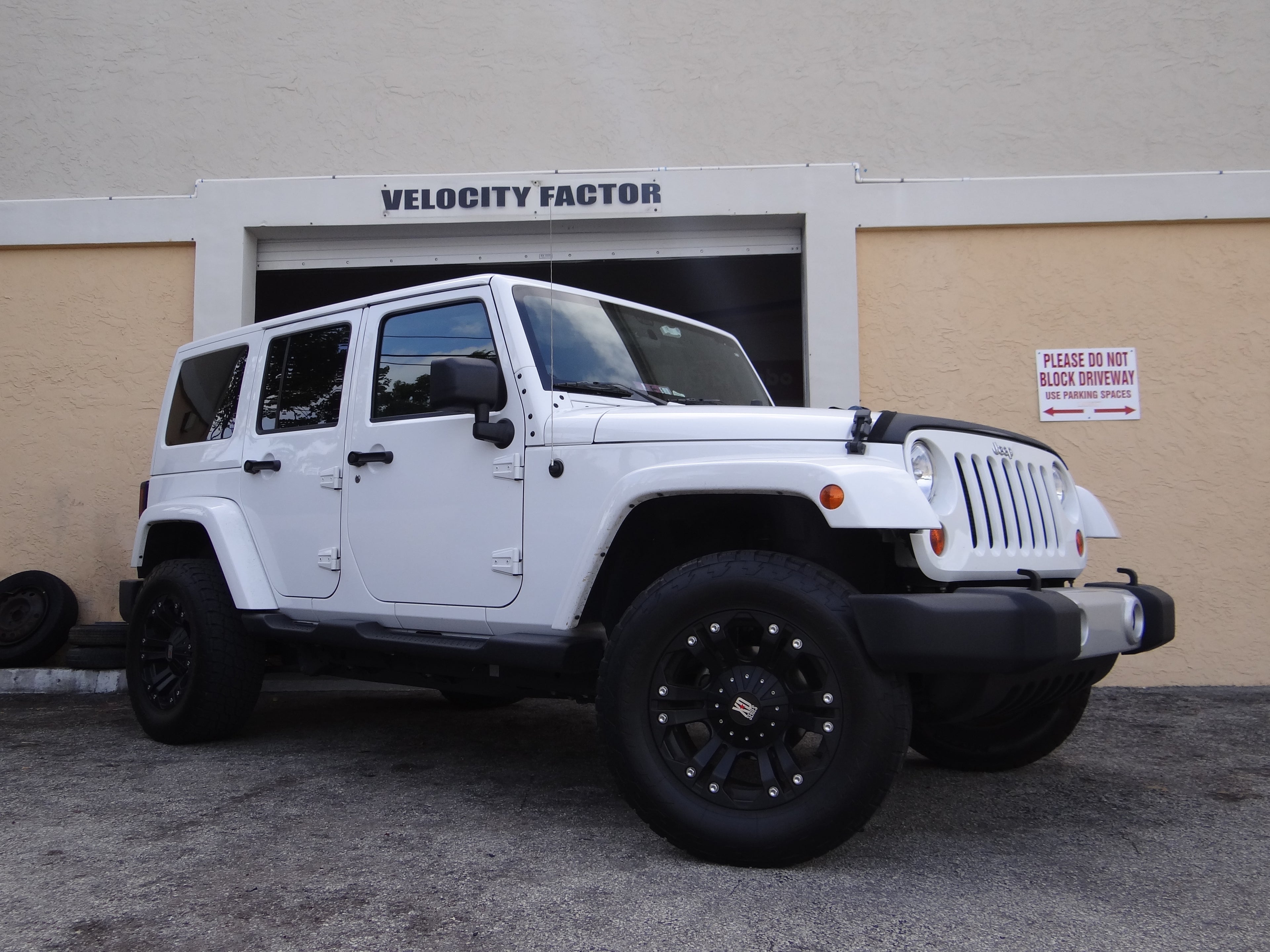 Velocity Factor Toughens Up  Jeep Wrangler with Front Rear Smittybilt Bumpers added Front PIAA Fog Lights and Winch.