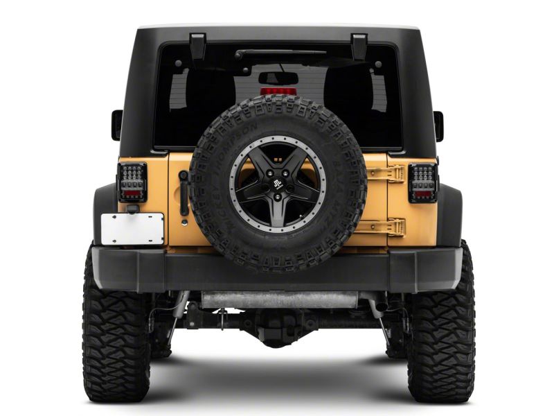 Raxiom 07-18 Jeep Wrangler JK Axial Series Lux LED Tail Lights- Black Housing (Clear Lens)