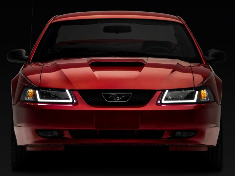 Raxiom 99-04 Ford Mustang Axial Series Headlights w/ LED Bar- Black Housing (Clear Lens)