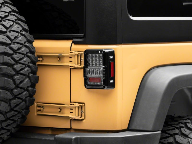 Raxiom 07-18 Jeep Wrangler JK Axial Series Lux LED Tail Lights- Black Housing (Clear Lens)