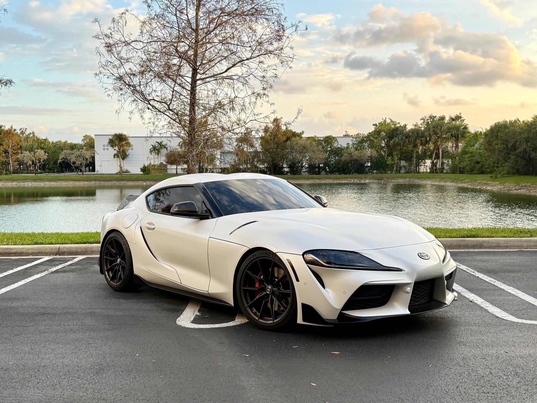 White Toyota GR Supra MK5 photographed at golden hour by Velocity Factor in South Florida