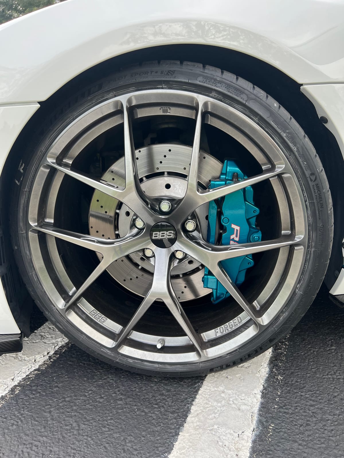 White Audi R8 with custom teal brake calipers finished at Velocity Factor