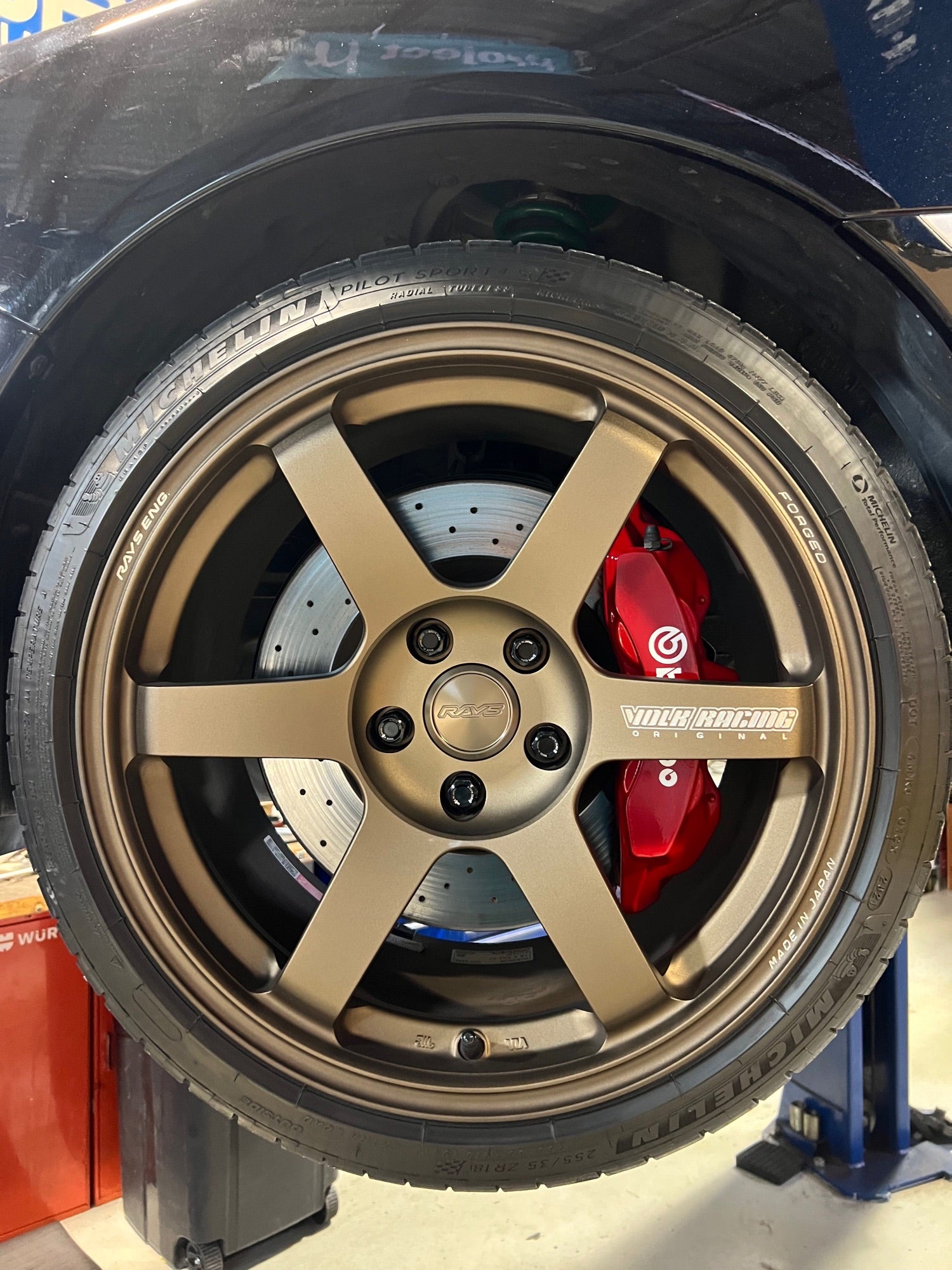 Bronze RAYS Volk TE37 with Michelin Pilot Sport 4S and red Brembo brakes installed at Velocity Factor